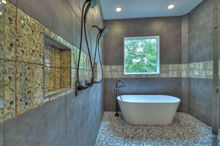 Hand painted tile from Spain incorporated into the design of the shower