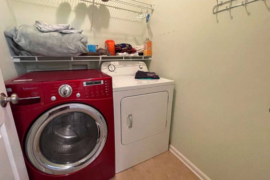 laundry is upstairs in a room