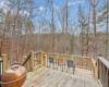 Back deck area with new deck space added to enjoy private wooded lot